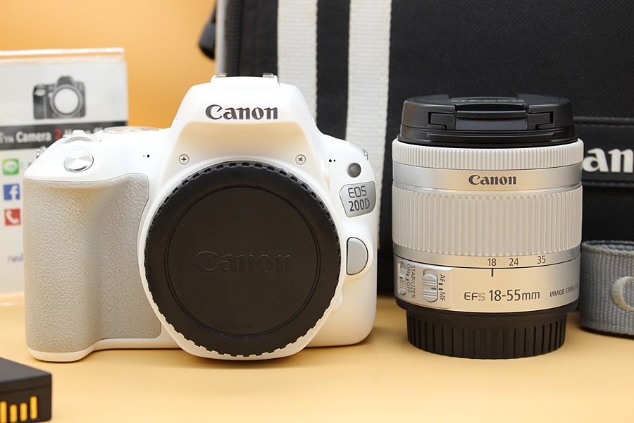 ขาย Canon EOS 200D + Lens 18-55mm IS STM (สีขาว) สภาพสวย อดีตประกันร้าน ใช้งานน้อย มี WIFIในตัว เมนูไทย จอติดฟิล์มแล้ว อุปกรณ์พร้อมกระเป๋า  อุปกรณ์และรายละ